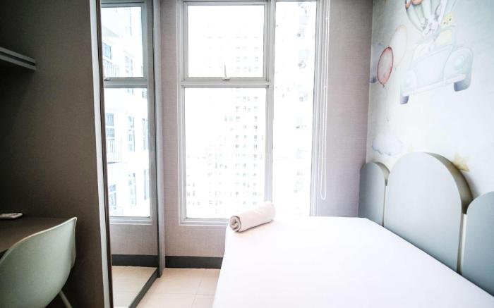 Simple 2BR at Benson Supermall Mansion By Travelio