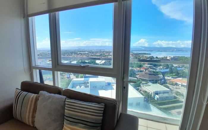 Mactan Newtown Beach Condo by FJCIVO 