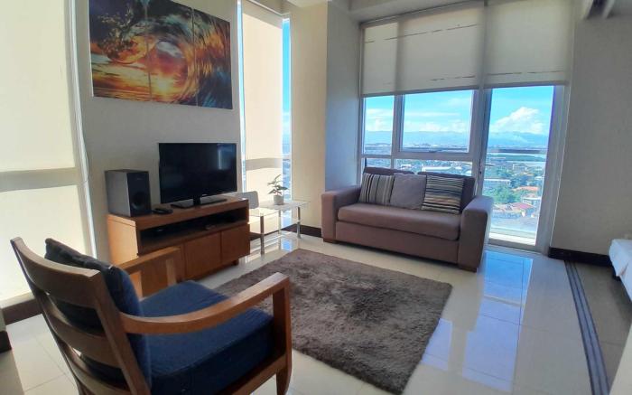 Mactan Newtown Beach Condo by FJCIVO 