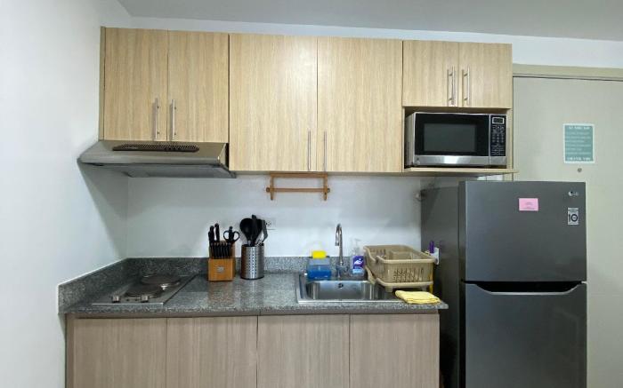 Cozy 2 BR unit @ South Residences Las Pinas (1206)