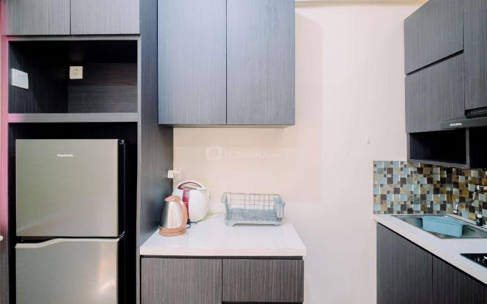 Good & Cozy Studio Green Pramuka City By Travelio