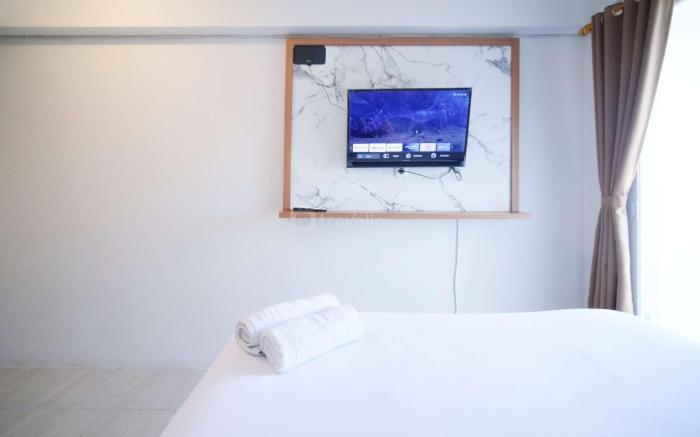 Simple Studio Apt at Suncity Residence By Travelio