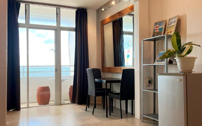 Beachfront Flat w/ Two Beds,  Kitchen & Balcony