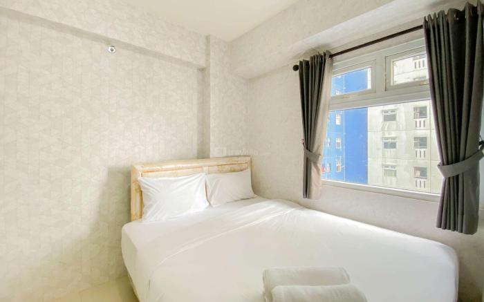 Comfort 2BR Apt Green Pramuka City By Travelio