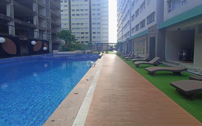 Cozy 2BR @ Royal Makassar Apartment By Travelio
