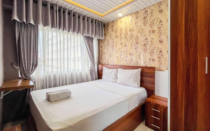 Cozy 2BR @ Royal Makassar Apartment By Travelio