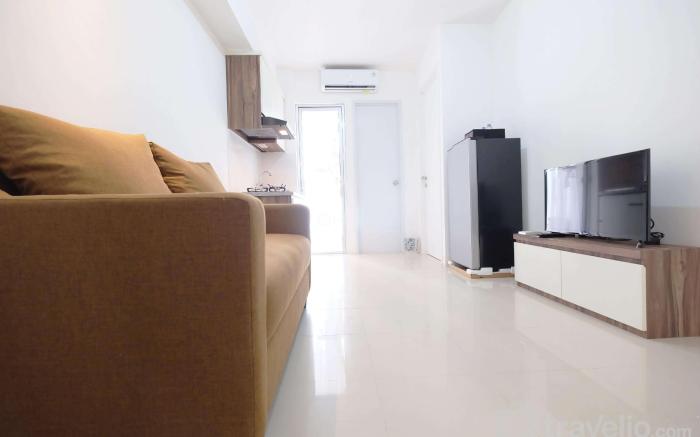Comfy 2BR Bassura City Apartment By Travelio
