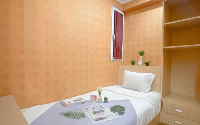 Relaxing 2BR Mutiara Bekasi Apartment By Travelio