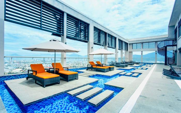 Hosted by LIVIE, Beachfront Comfort Suite