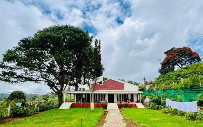 Nilgiris INN Deluxe Room
