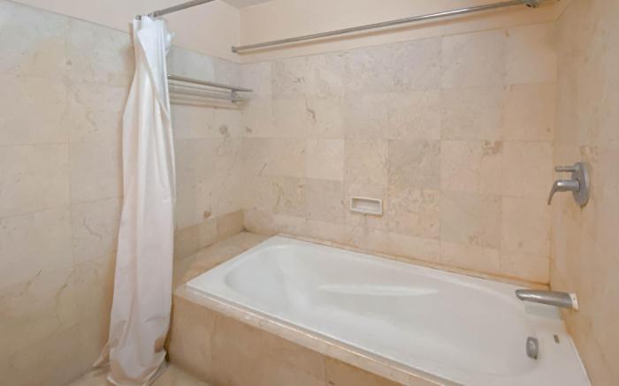 Clean 2BR at Braga City Walk Apartment By Travelio