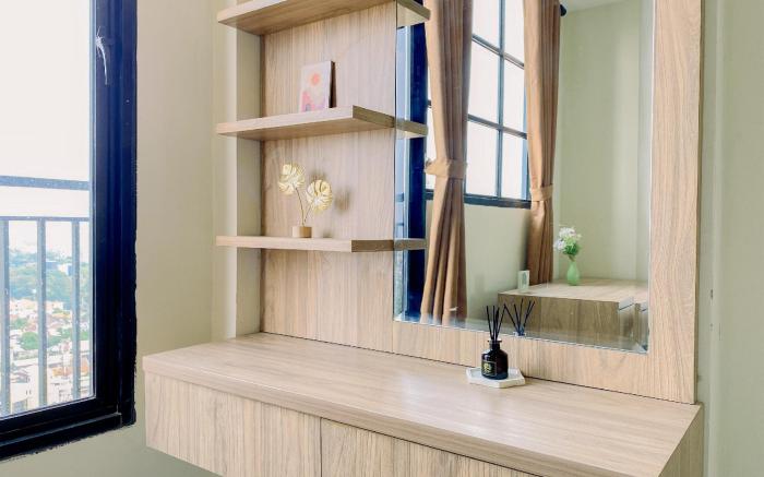 Comfy Studio Apt at Evenciio Margonda By Travelio