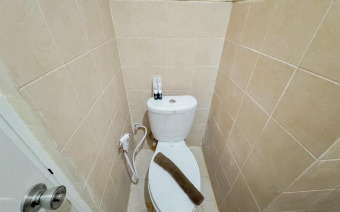 Compact Restful 2BR at Menara Rungkut By Travelio