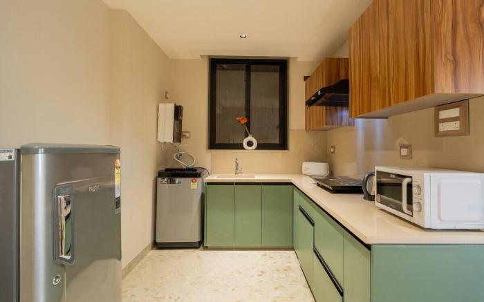 ELIVAAS 1 BHK with Rooftop Pool - Kamerios Verano