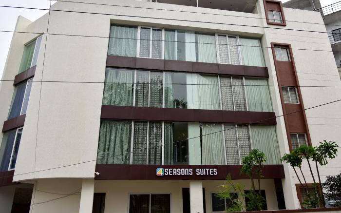 SEASONS SUITES