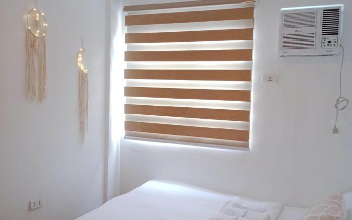 Fully interiored 2 bedroom Bali style w/parking