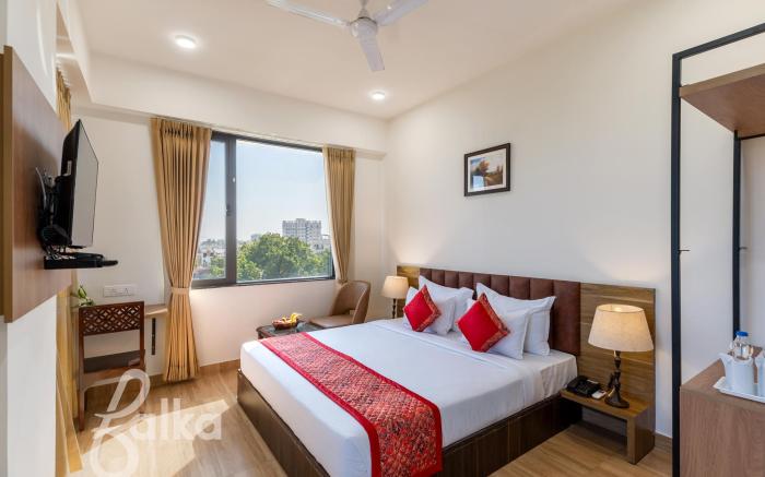 Hotel De Glance - Udaipuri Restaurant I Terrace Swimming pool I Banquet