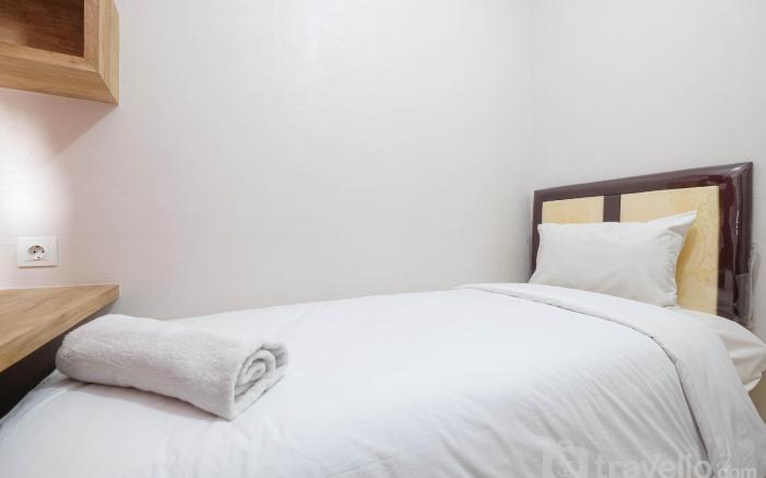 Modern and Cozy 2BR Podomoro Golf View By Travelio