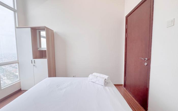 Homey 3BR at Grand Sungkono Lagoon Apt By Travelio