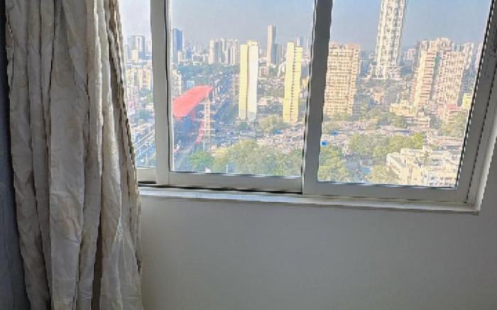 Pixiestays | smart tv, wifi | 2507 2bhk Malad