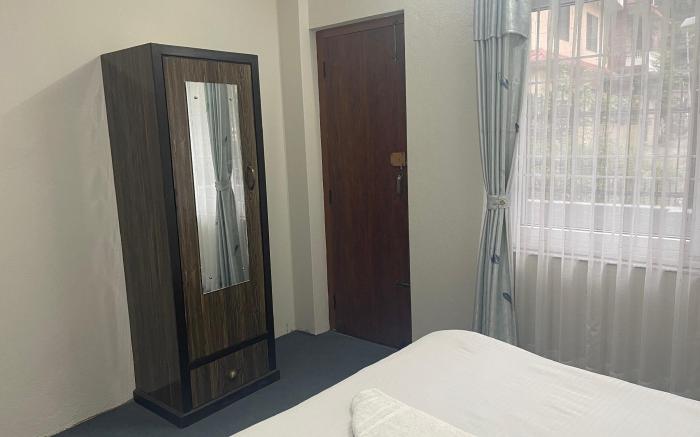 Couple bedroom with attached bathroom & balcony 