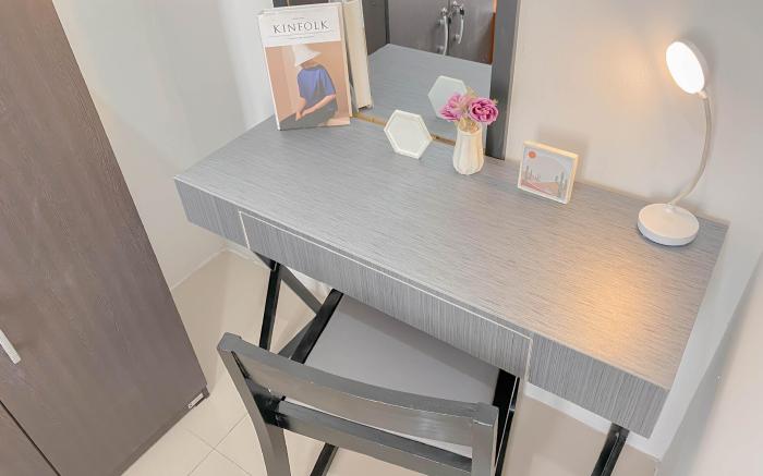 Minimalist 1BR Apt Vittoria Residence By Travelio