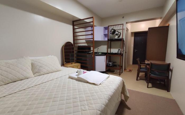 Classy Condo Studio Type With Pool, King Size Bed