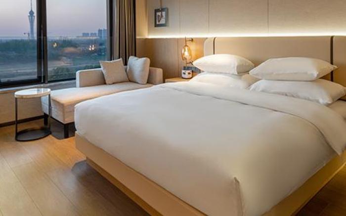 Maison New Century Hotel Lu'an