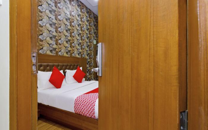 Capital O 9996 Hotel Arton Suites