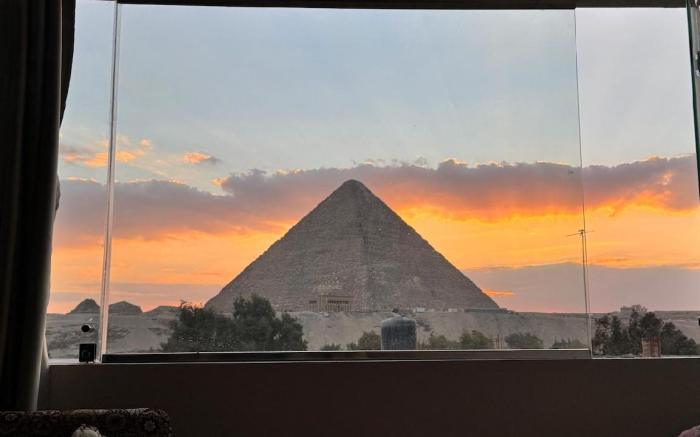 Khufu's Luxury Pyramids View