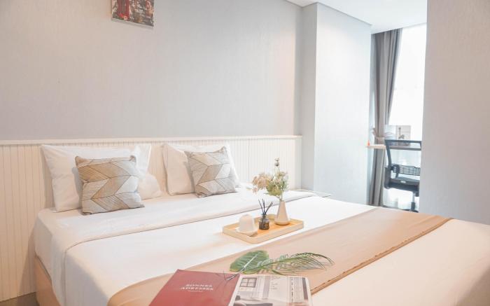 Modern 2BR Apartment Tamansari Iswara By Travelio