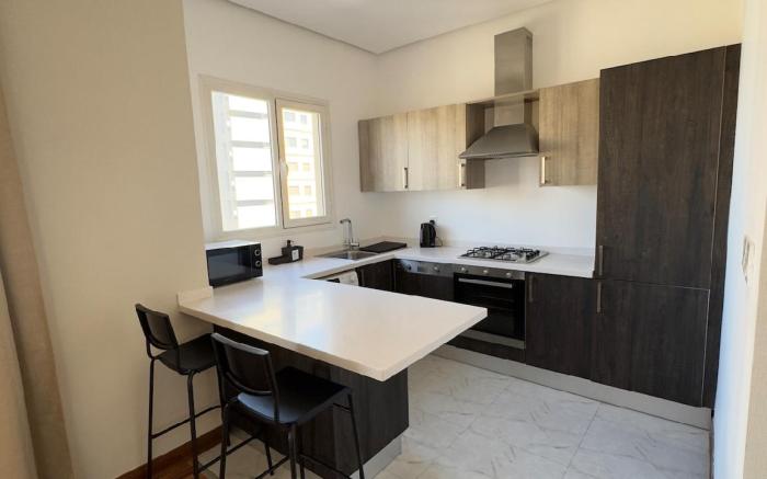 Cozy One-Bedroom Elegant Apartment in Salmiya 17