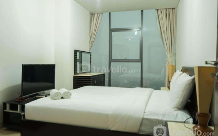 2BR with Study Room at L'Avenue Apt By Travelio