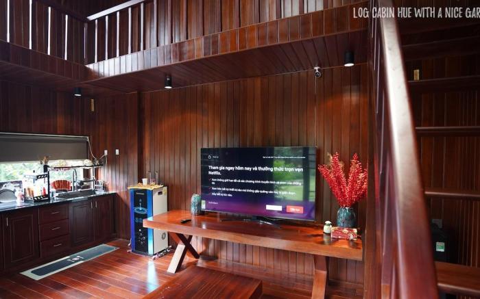Log Cabin Hue with a nice garden with BBQ party.
