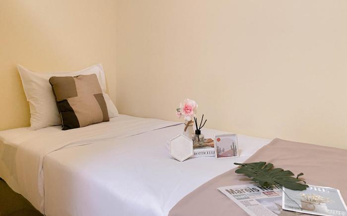 Comfy 2BR Apt Woodland Park Residence By Travelio