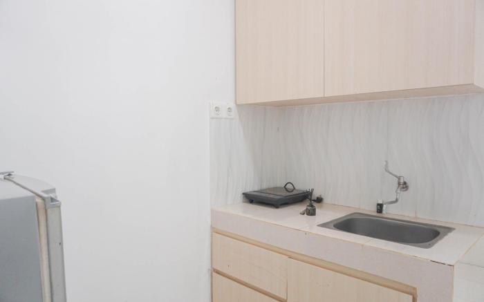 Cozy Living 1BR at Sentul Tower Apt By Travelio