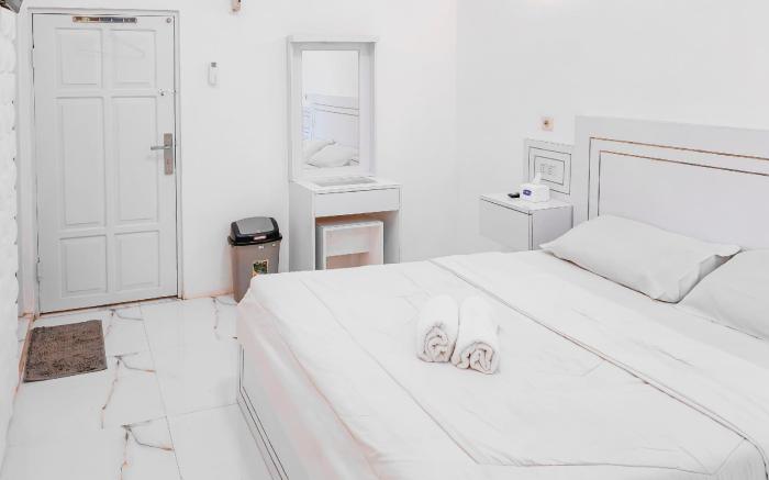 Kaku Maru Kostel Mitra RedDoorz