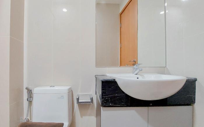 Elegant 2BR The Reiz Condominium Medan By Travelio