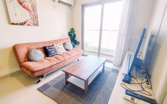 Homey Designed 2BR at Praxis Apartment By Travelio