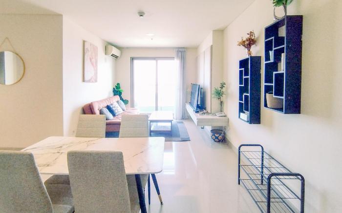 Homey Designed 2BR at Praxis Apartment By Travelio