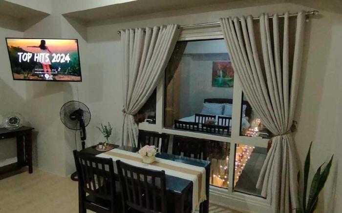 ROOMY Condotel Across NAIA T3