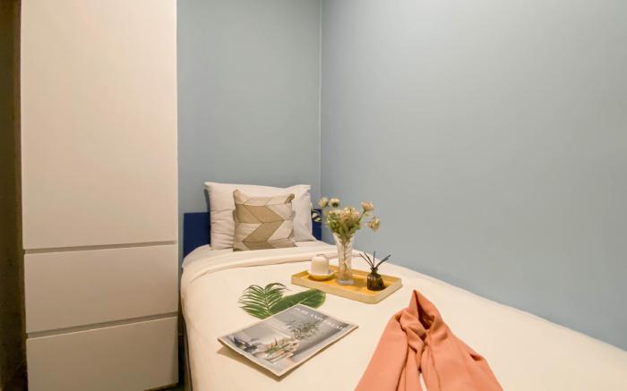 Spacious Cozy 2BR at Apt Meikarta By Travelio