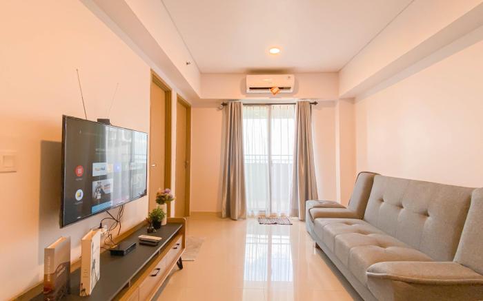 Enjoy Living 2BR at Meikarta Apartment By Travelio