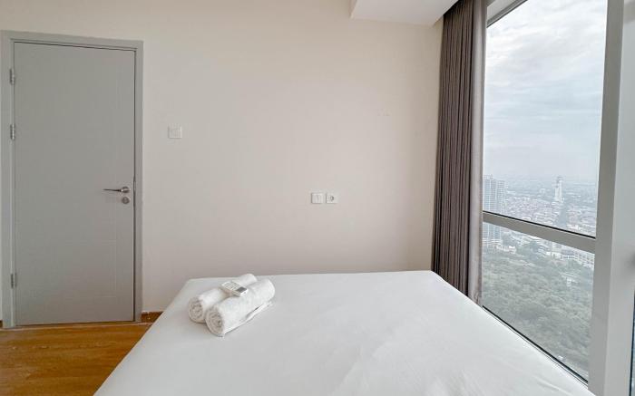 Modern Suite 1BR Grand Sungkono Lagoon By Travelio