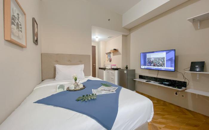Relaxing Studio Apt Transpark Juanda By Travelio