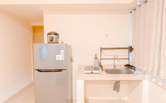 Warm and Cozy 2BR Meikarta Apartment By Travelio