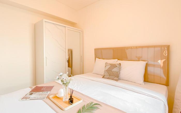 Warm and Cozy 2BR Meikarta Apartment By Travelio