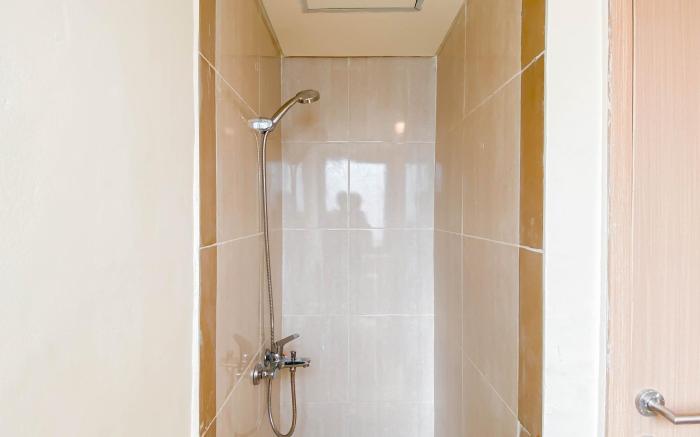 Homey and Modern 2BR at Meikarta Apt By Travelio