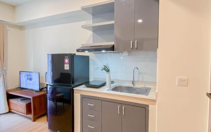 Warm 1BR with Makeup Room at Meikarta By Travelio