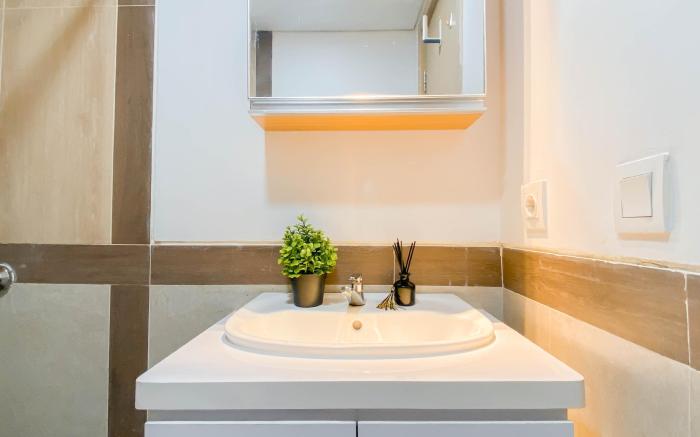 Neat Simple 2BR at Meikarta Apartment By Travelio